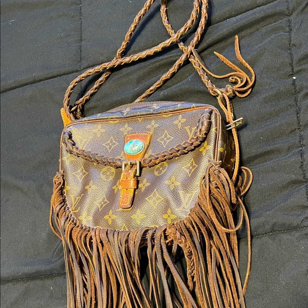 Authentic Louis Vuitton Fringe Purse.